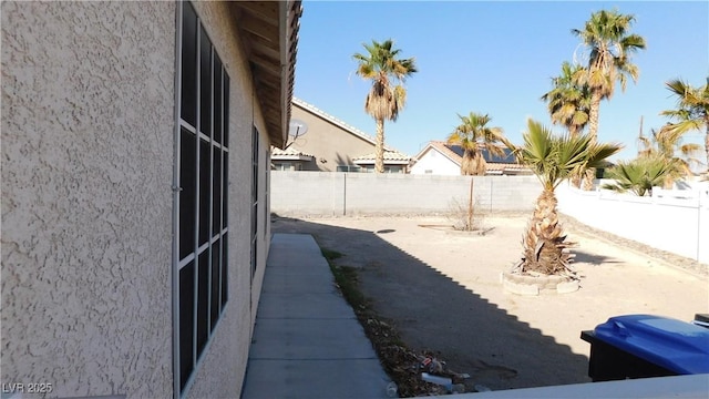 view of yard featuring a patio and a fenced backyard