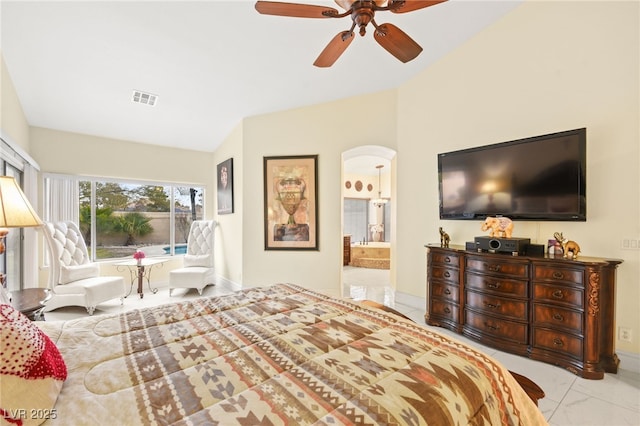 bedroom with ceiling fan and connected bathroom