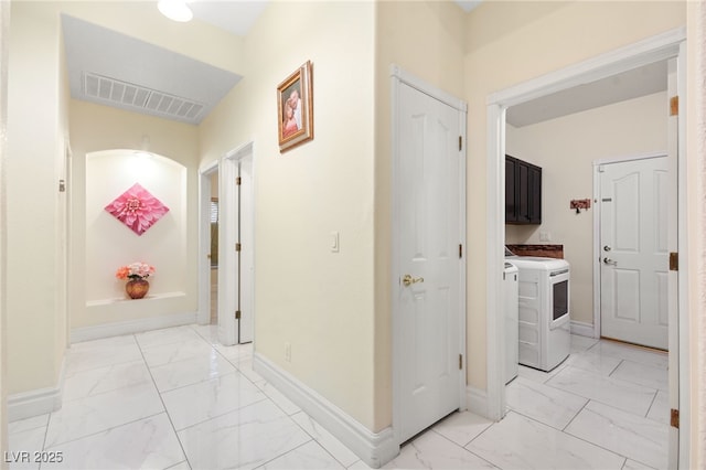 hallway featuring washer / dryer