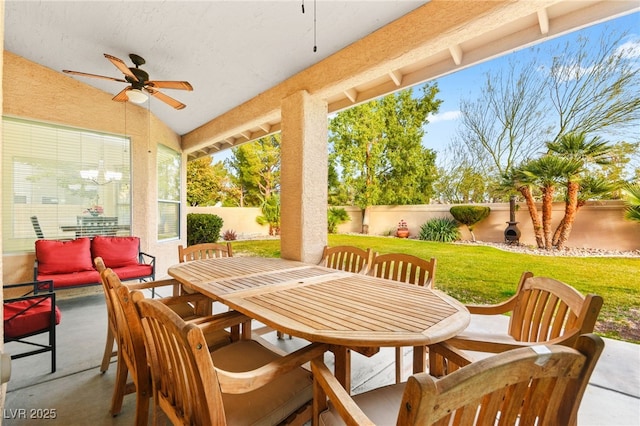 view of patio with ceiling fan and an outdoor living space