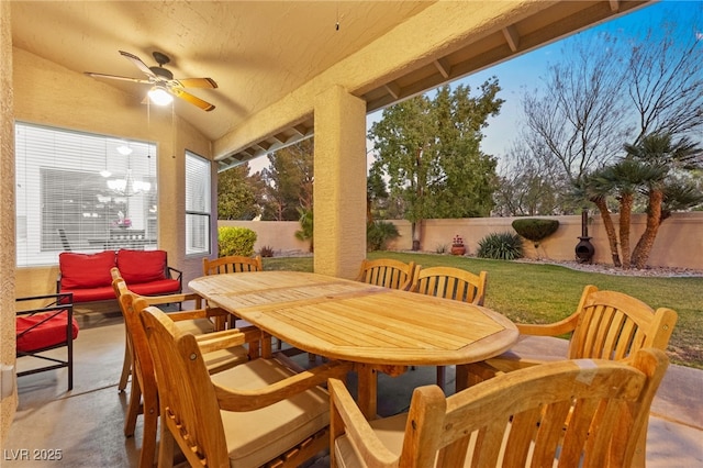 view of patio featuring ceiling fan