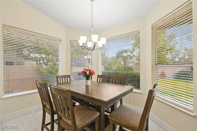 dining room featuring a chandelier