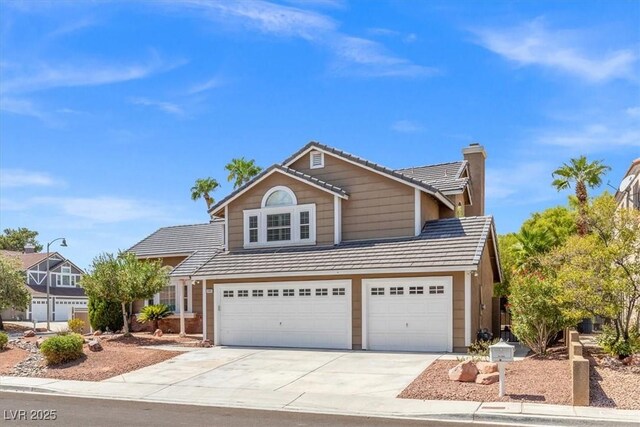 front facade with a garage