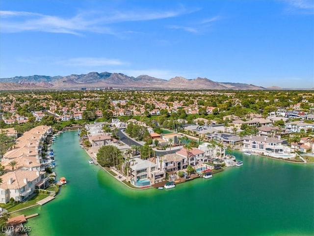 aerial view with a water and mountain view