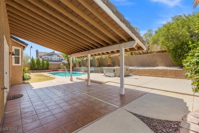 view of patio / terrace featuring a fenced in pool