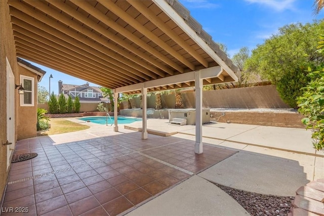 view of patio with a fenced in pool and a fenced backyard