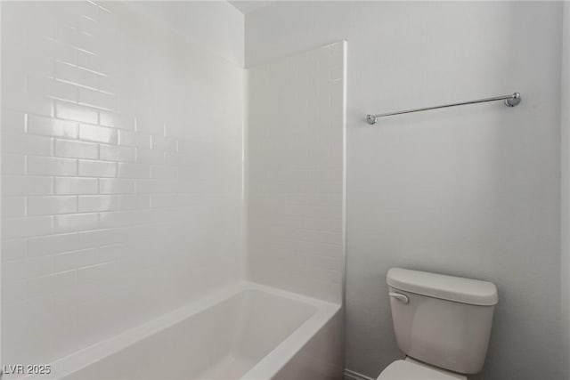 bathroom with toilet and tub / shower combination