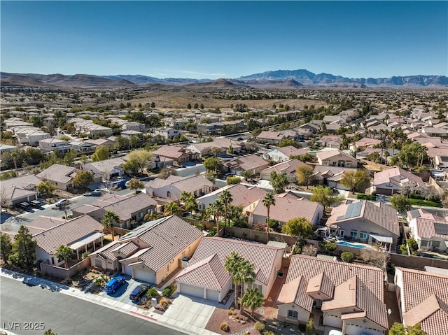 bird's eye view with a mountain view and a residential view