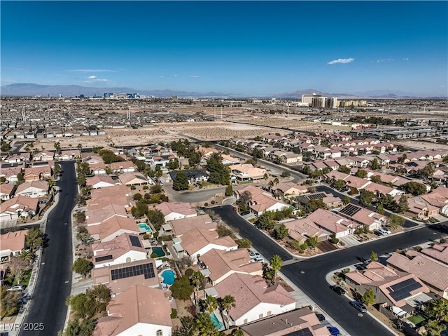 birds eye view of property featuring a residential view and a mountain view