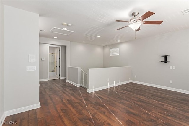 spare room featuring dark hardwood / wood-style flooring