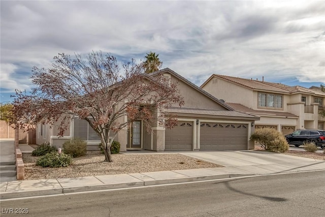 view of front of property with a garage