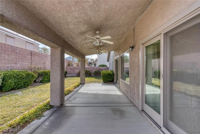 view of patio featuring ceiling fan