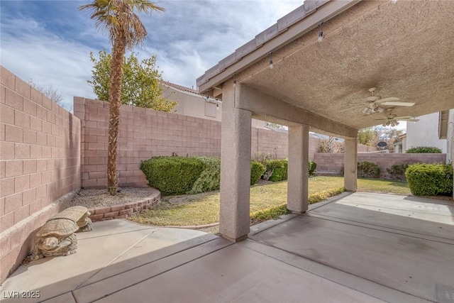 view of patio / terrace featuring ceiling fan