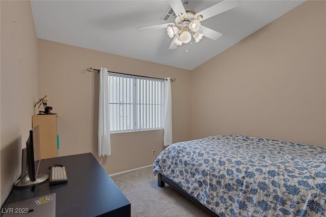 bedroom featuring lofted ceiling, ceiling fan, and carpet