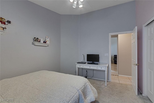 bedroom with light colored carpet