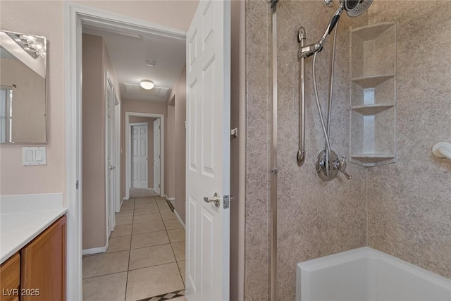 bathroom with vanity and tile patterned flooring