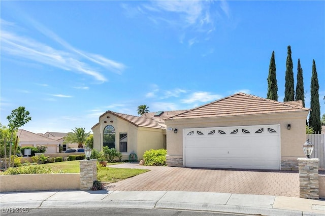 single story home with a garage