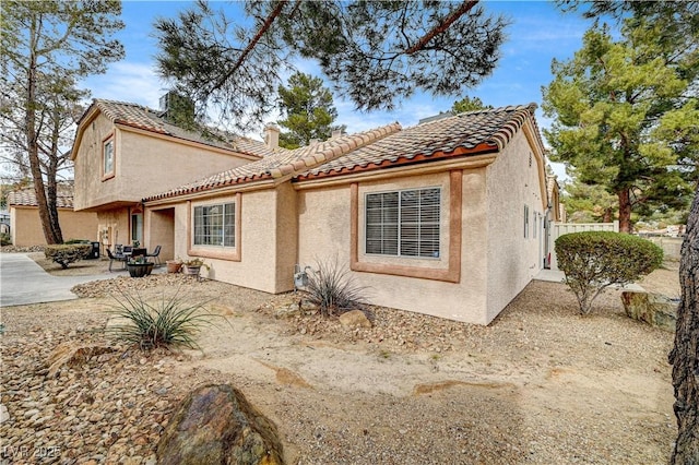 view of front of home featuring a patio area