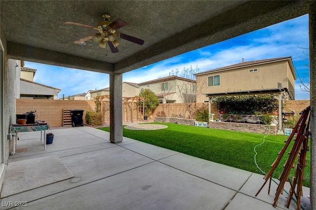 view of patio / terrace featuring ceiling fan