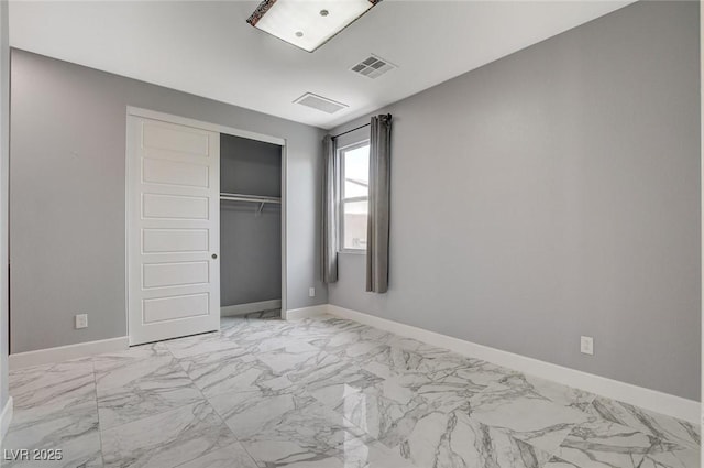 unfurnished bedroom featuring a closet