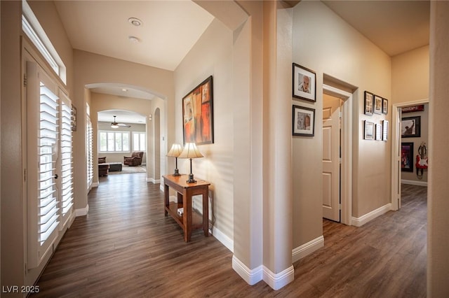 hall with dark hardwood / wood-style flooring