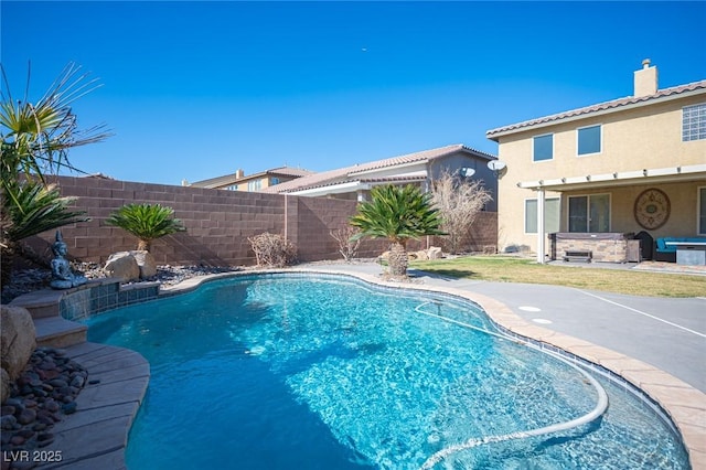 view of swimming pool featuring a patio area