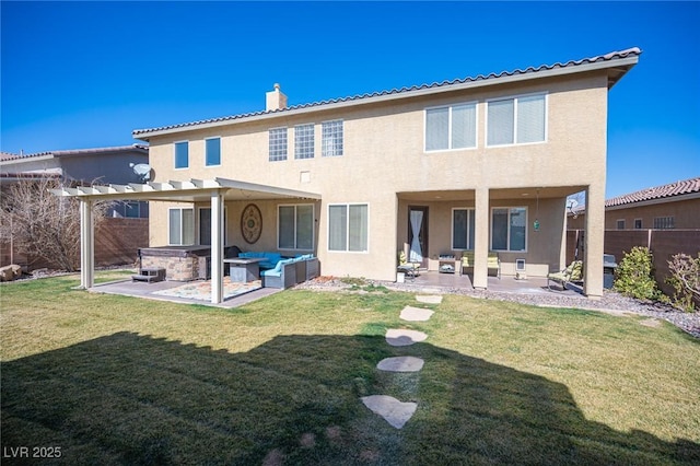 back of house featuring a patio, an outdoor hangout area, and a lawn