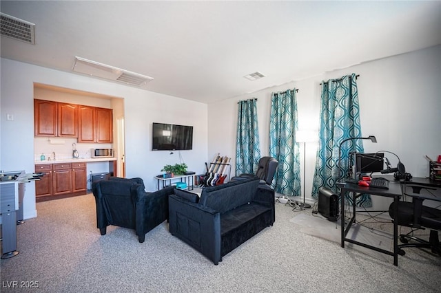 living room with light colored carpet