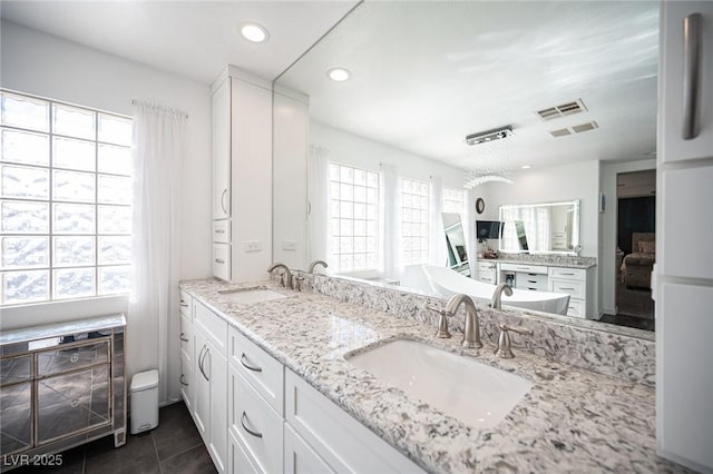 bathroom featuring vanity and tile patterned floors