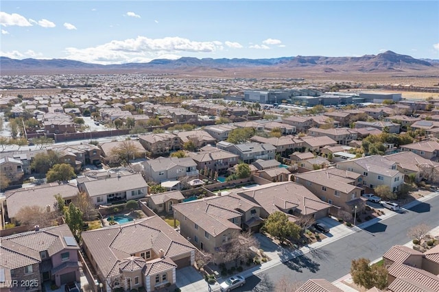 drone / aerial view featuring a mountain view