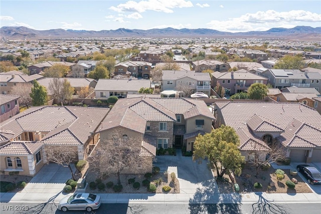 bird's eye view with a mountain view