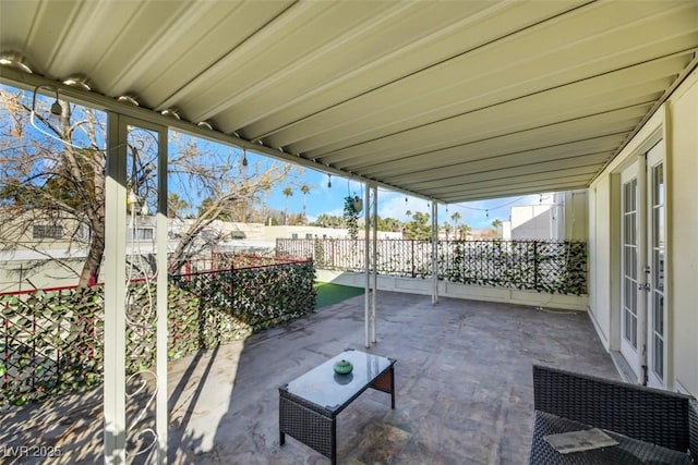 3473 Monte Carlo Dr, Las Vegas, NV 89121 - fenced backyard featuring french doors and a patio area