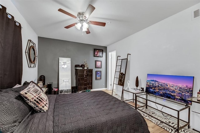 3473 Monte Carlo Dr, Las Vegas, NV 89121 - bedroom with wood finished floors and a ceiling fan