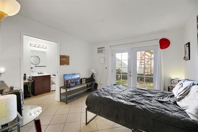 3473 Monte Carlo Dr, Las Vegas, NV 89121 - bedroom with french doors, access to outside, light tile patterned flooring, connected bathroom, and a wall mounted AC