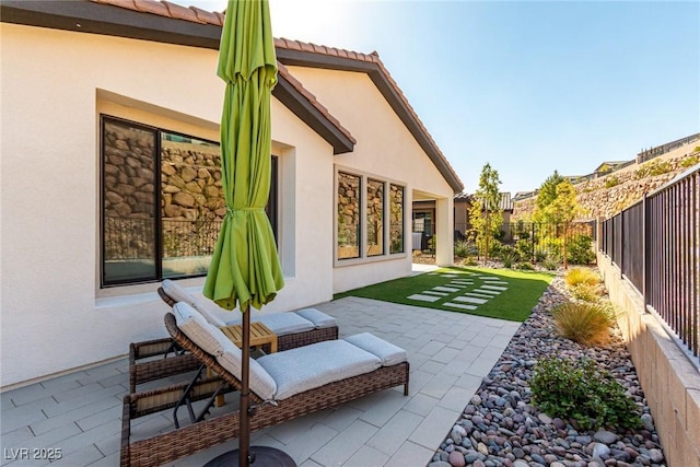 back of house with a patio area