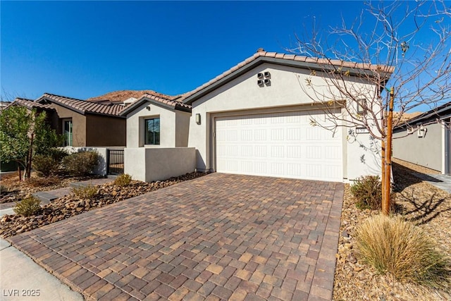 view of front of property with a garage