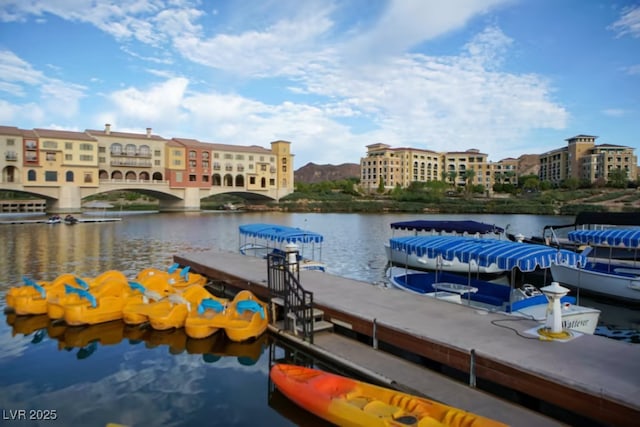 dock area featuring a water view