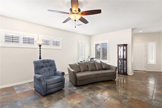 living room with ceiling fan