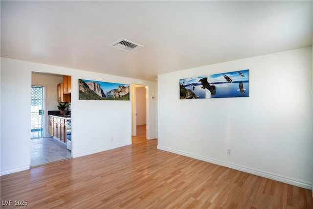 empty room featuring light wood-type flooring