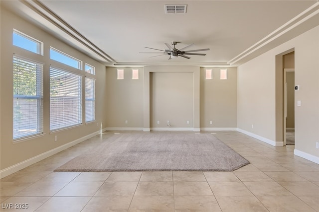 unfurnished room featuring light tile patterned floors and ceiling fan