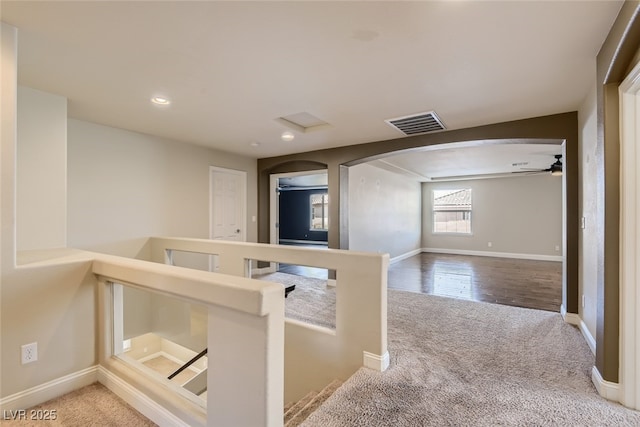 hallway featuring carpet flooring