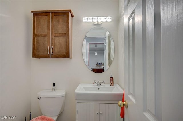 bathroom featuring toilet and sink