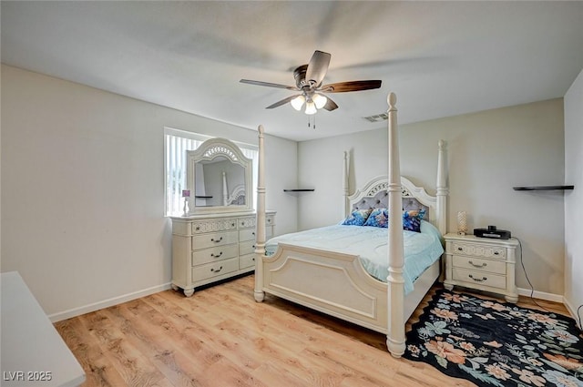 bedroom with light hardwood / wood-style floors and ceiling fan