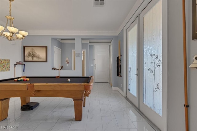 game room featuring a notable chandelier, crown molding, billiards, and french doors