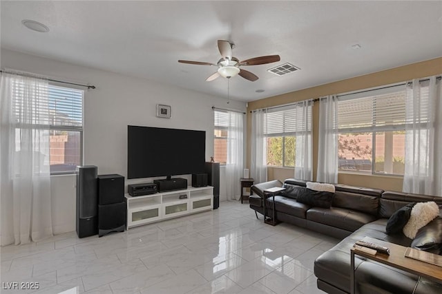 living room with ceiling fan