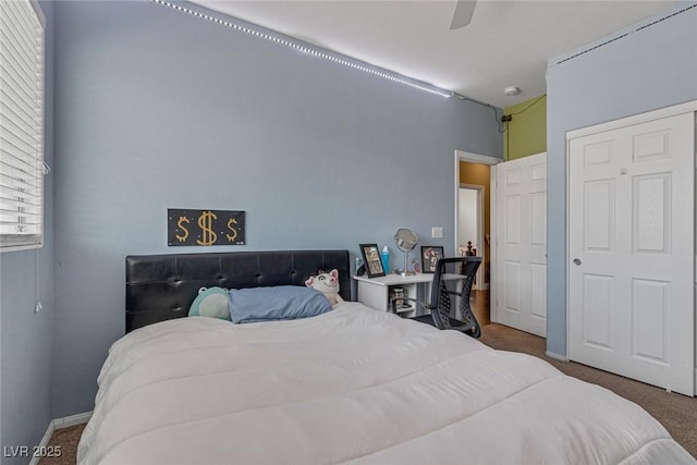 carpeted bedroom with ceiling fan