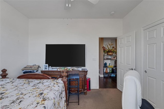 bedroom with ceiling fan and carpet flooring