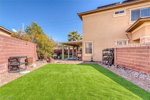 view of yard with a patio