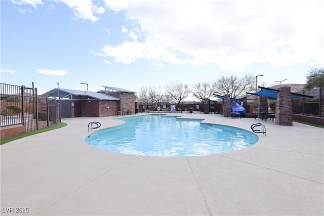 view of pool featuring a patio