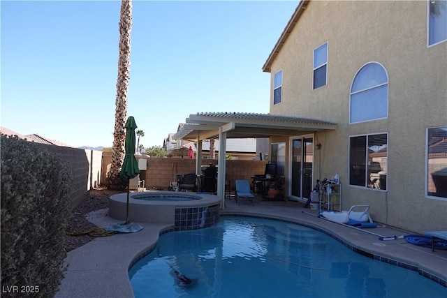 view of swimming pool featuring a pergola, a patio, and an in ground hot tub